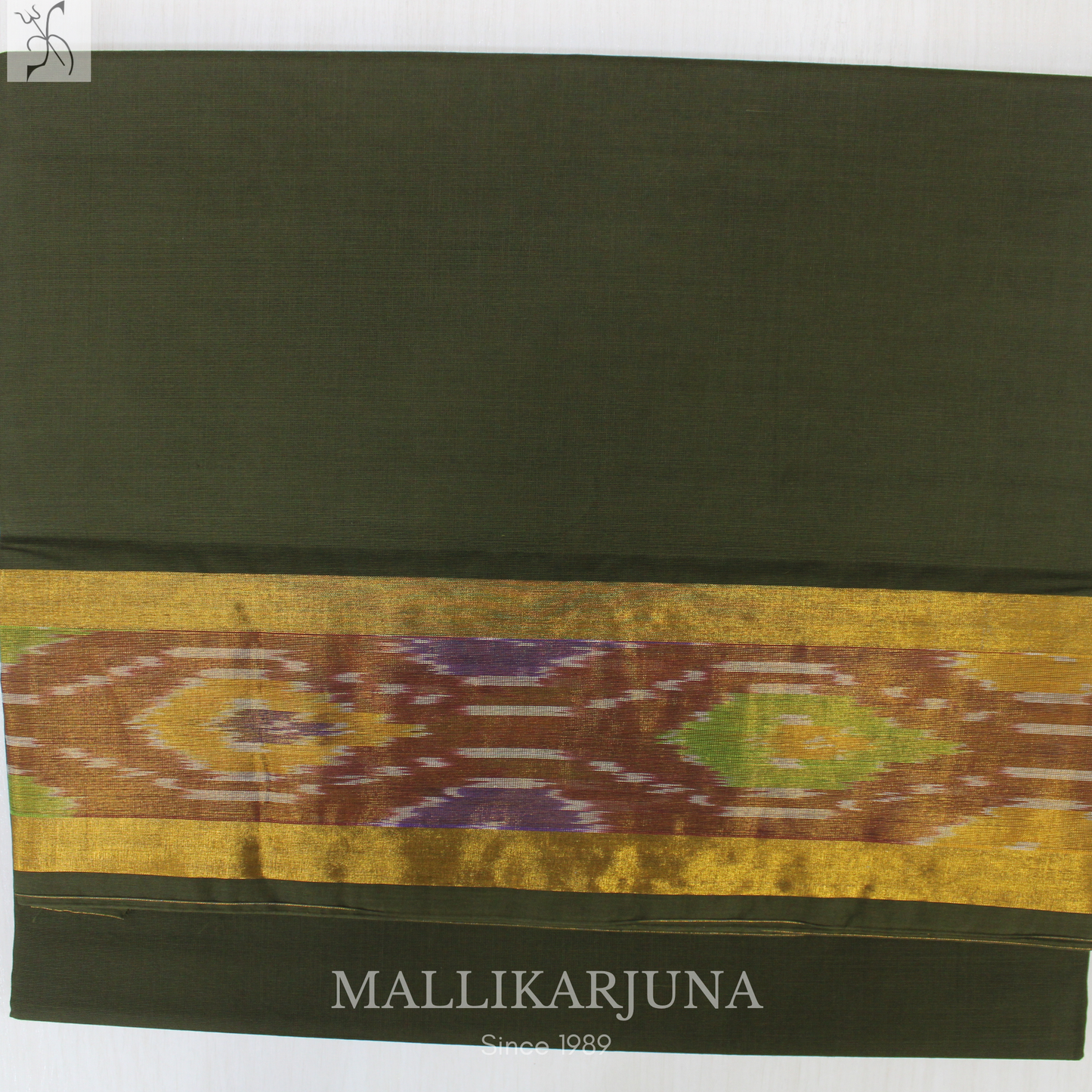 C55. Pure Bottle Green Plain Venkatagiri Cotton Saree